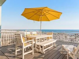 Dog-friendly beachfront dream with a wet bar & two furnished balconies