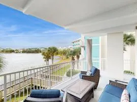 Enchanting & modern waterfront condo just steps to the beach pools & hot tubs