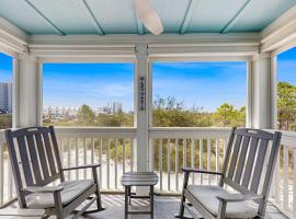 Gorgeous townhouse plenty of space lots of games shared pool close to beach, хотел в Пердидо Кий