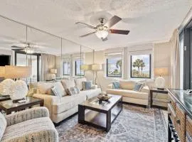Bright ocean-view condo with community pool and direct beach walkway