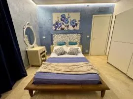 Room with private bathroom and terrace in villa