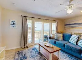 Bright condo with shared pool beach access & central location