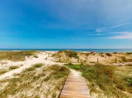 Dog-friendly beachfront home with private boardwalk park style grill deck beach view