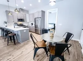 Dog-friendly home with two full kitchens balcony AC washers & dryers