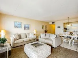 Updated beachfront condo with beach setup - quick drive to entertainment