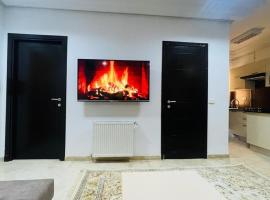 Spacious Apartment Ennasr 2-BR, готель у місті Аріана