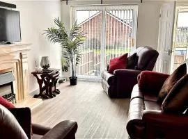 Peaceful 2-Bed Bungalow with Garden & Parking in Bramley Village, Rotherham