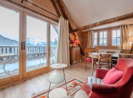 Le Chalet du Village - Parking, hotel en Huez