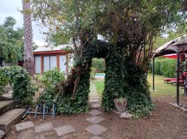 Cabaña acogedora en Olmué con piscina y parrilla, viešbutis mieste Olmujė