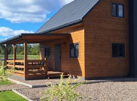 Mazurski domek nad jeziorem w miejscowości Elganowo, hotel u gradu Pasim