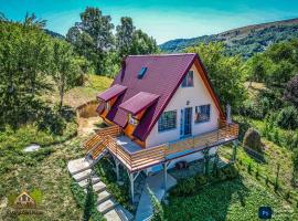 Căsuța din livadă, hotel Secăria városában