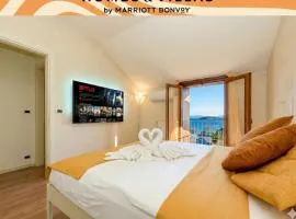 Eden Lake view and private beach renovated in 2025 DesenzanoLoft Official Partner Homes & Villas by Marriott Bonvoy