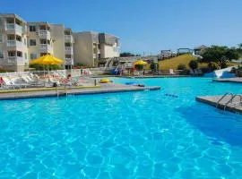 Coastal Condo with outdoor pool, hot tub, and beach access