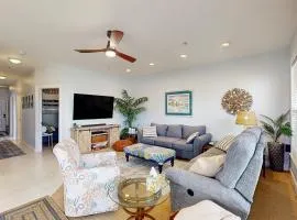Sound side condo with sunset view balcony - close to pool, hot tub, and pier
