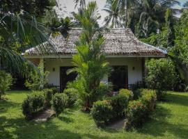 Happy Coconut Camiguin, hotel em Mambajao