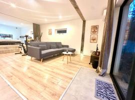 Loft face à la Seine - 7min Gare, Hotel in Juziers
