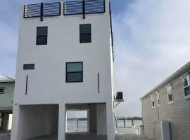 Icon on the bay- Panoramic views- Rooftop hot tub