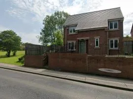 Peaceful modern home with garden and parking