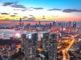 Qingdao Yiran Wanjia Hotel Apartment (May Fourth Square Wanxiang City Branch): Qingdao şehrinde bir kendin pişir kendin ye tesisi