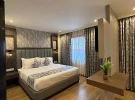 Grand Plaza Inn by RAK Rooms, Kannur