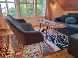 Central and cozy with a veranda
