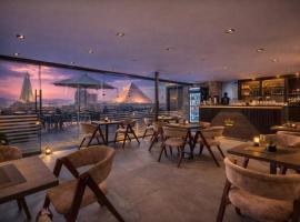 TAJ Suites Pyramids View Hotel, hotel a Il Cairo