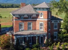 Hot Tub Access Historic Group Getaway in Amherst!