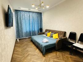 1 комнатная квартира в центре Конаева, Hotel in Qapschaghai