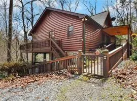 Discover tranquility at Hidden Oasis, a charming home nestled in serene Cherry Log Mountain