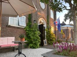 Kerkhotel Bij De Pastorie, hotel v destinaci Reitsum
