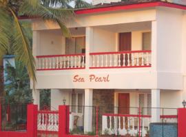 Sea Pearl Guesthouse, hostal o pensión en Candolim