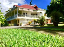Résidence Bougainvillee, hotel sa parkingom u gradu Pti Bur