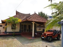 Kunnathu Tharavadu Heritage Homestay, хотел в Котаям