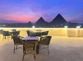 King's Gate Majestic pyramids & Sphinx view