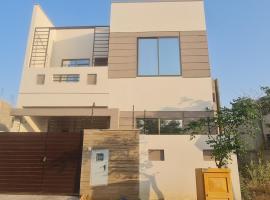 Btk Guest House, hotel i Karachi