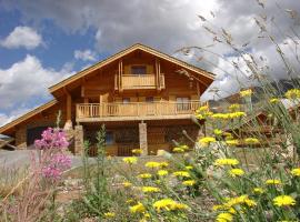 Madame Vacances Les Chalets de l'Altiport, hotel en L'Alpe-d'Huez
