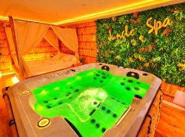 JUNGLE SPA-4 Pers-Jacuzzi-Parking-Jardin-Clim-Colmar, hotel i Muntzenheim