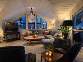 Beautiful and modern house with 4 bedrooms and 2 bathrooms, Hotel in Myrvoll