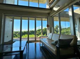 Private Villa The Beach AMAMI โรงแรมในTatsugo
