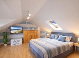 Haus Lüttje Hörn Apartment Meer, Hotel in Schillig