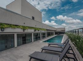 Estúdio Mobiliado próximo a UFU Santa Mônica - Actual House, hotel i Uberlândia