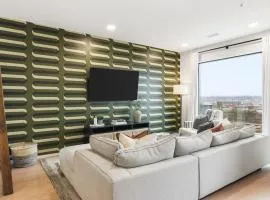 Penthouse River View Condo with Patio and Parking near Downtown
