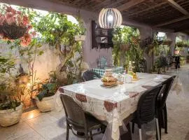 Casa com Ar Lareira e Churrasqueira no Centro