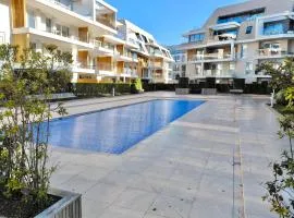 Luxury Apartment with Pool & Parking