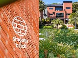 스무스브릭 Panoramic tangerine field view private villa, year round heated kids pool, BBQ, center of Seogwipo, Maeil Olle Market 5 minutes, near Jungmun Tourist Complex