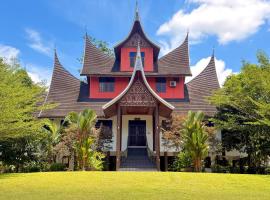 Astana Az-Zahrah, hotel di Bahau