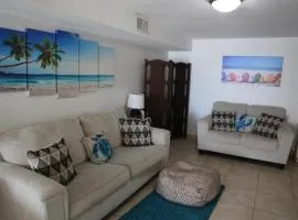 Oceanfront Bliss: 3-Bedroom, Pools & Peloton bike!