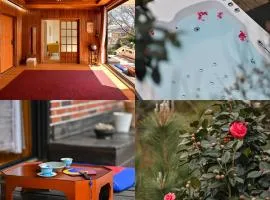 양옥집소정원 Fantastic ocean view private house, year round spa jacuzzi, BBQ,Seogwipo tourism center, Maeil Olle Market 5 minutes, Jungmun Tourist Complex, near Hallasan