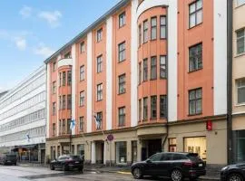 1BR Demure Design & Urban Living in Kamppi