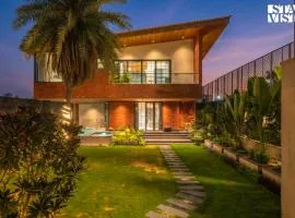 StayVista at Palm Tree Breeze with Pool, Bonfire